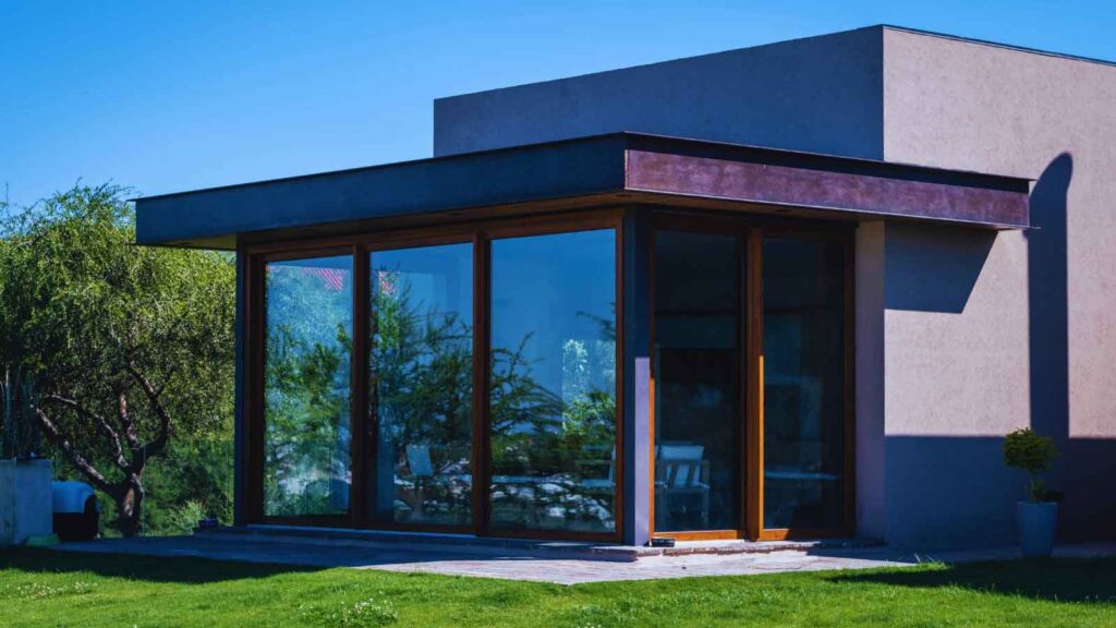 Modern home exterior using window tint for UV and heat control