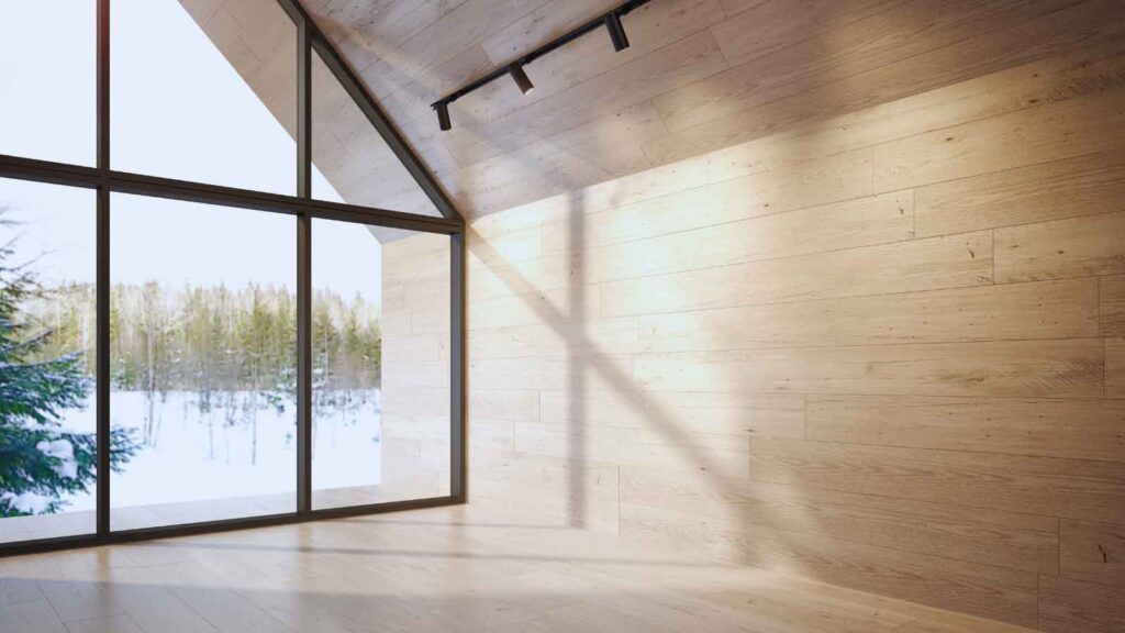 Large glass windows with UV protection window tint in a wood-finished home 